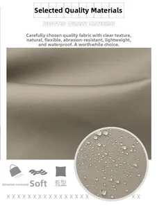 Detailed view of waterproof khaki nylon fabric with visible water droplets and twill texture