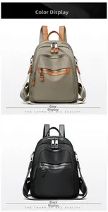 Detailed comparison of gray and black nylon backpacks with leather zipper pullers