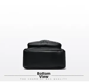 Detailed bottom view of the black lychee texture PU leather backpack with neat stitching
