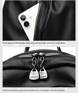 Detail of lychee textured leather backpack featuring front zip pocket and metal kangaroo pullers