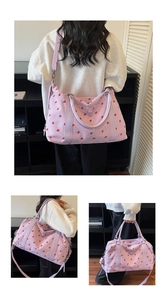 Purple corduroy travel bag with strawberry prints shown in various carrying styles