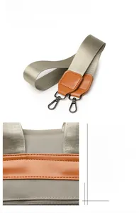 Macro detail of high-density nylon strap with leather trim and durable metal buckle