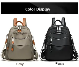 Dual comparison of black and gray nylon backpacks featuring multi-zippered compartments