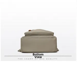 Detailed view of the rectangular flat base and reinforced stitching of the backpack
