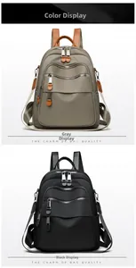 Detail view of versatile casual backpacks in gray and black with multi-pocket design