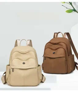 Detail of woven texture and dual-zipper front pockets on stylish large backpacks