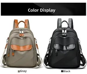 Detailed comparison of gray and black nylon backpacks with multiple zipper compartments