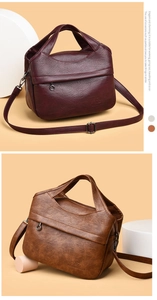 Detail of vintage faux leather tote bag with multi-layer pockets and oil wax finish