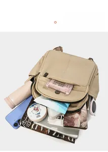 Top view of spacious khaki woven backpack main compartment showing large storage capacity