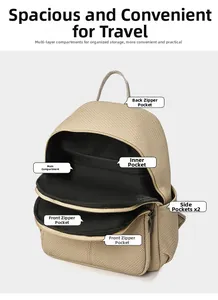 Detail view of large capacity beige backpack with multiple compartments and zippers