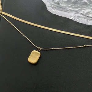 Double-layered gold titanium steel necklace with snake chain and rectangular pendant