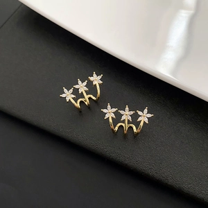 Elegant gold earrings with three small flowers and marquise-cut white zircons for women