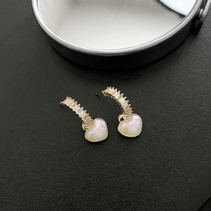 Elegant gold-plated heart earrings with sparkling crystals and iridescent heart pendants