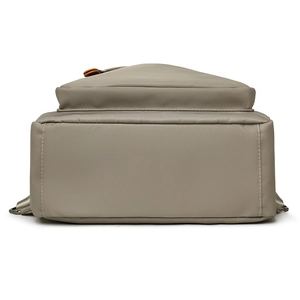 Bottom view of lightweight light grey nylon travel backpack with reinforced stitching