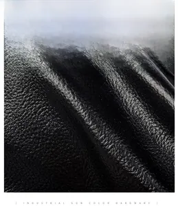 Close-up of waterproof black lychee texture leather with gunmetal hardware details