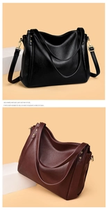 Detail of high-quality lychee grain leather texture on black and burgundy bucket bags