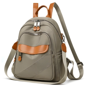 Large capacity nylon backpack for women with contrast leather trim and water resistant fabric