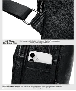 Close-up of black lychee grain leather backpack with metal ring and side phone pocket