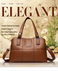 Detailed view of brown litchi pattern leather tote with kangaroo logo and elegant stitching
