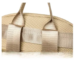 Close-up of reinforced stitching and durable twill texture on a stylish travel backpack