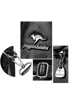 Detail of lychee pattern leather bag with silver kangaroo logo and metal hardware