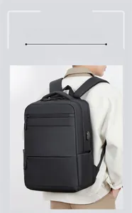 Detail view of the black business backpack with external USB charging port and side pocket