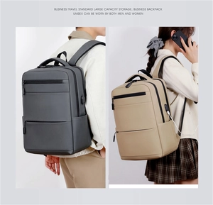 Business laptop backpack with USB charging port shown in grey and beige colors