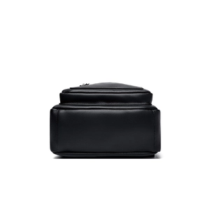 Classic black pebbled leather backpack with premium stitching and minimalist metal zipper
