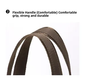 Detailopname van het stevige bruine nylon handvat met versterkte dubbele stiksels