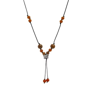 Elegant woven butterfly necklace with amber beads and silver pendant on white background