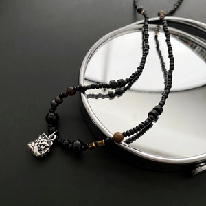 Orientalische Perlenkette mit Tigeraugensteinen und silbernem Löwenkopfanhänger für Damen