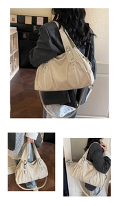 Detail view of beige tote bag showing high-quality PU leather texture and zipper design
