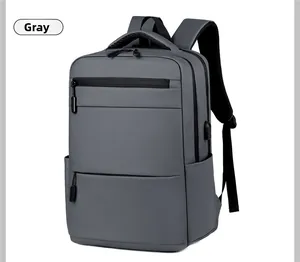 Detail of grey waterproof laptop backpack featuring external USB charging port