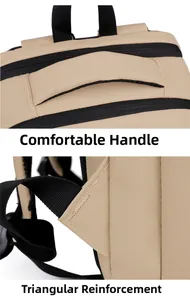 Detail of reinforced triangular stitching and comfortable handle on a beige backpack
