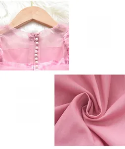 Vue détaillée de la robe rose pour fille avec perles faites main et doublure en coton
