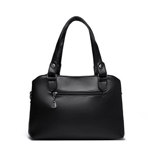 Elegant black lychee grain leather bucket bag with top handles and silver hardware accents