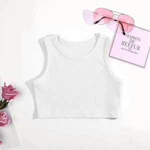 Detail shot of white ribbed cotton tank top for girls with stylish pink accessories