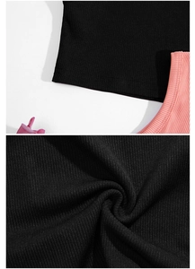 Close-up of ribbed cotton girl's tank top showing double-stitched hem and soft texture