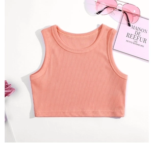 Close-up of coral ribbed knit cotton tank top for girls with stylish texture detail