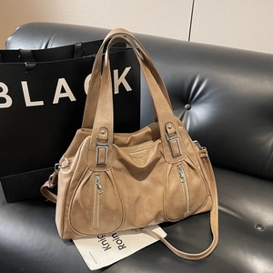 Large khaki tote bag in soft PU leather with dual zipper pockets and adjustable shoulder strap