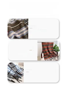 Detailed view of high quality plaid scarf showing soft brushed texture and tassel edges