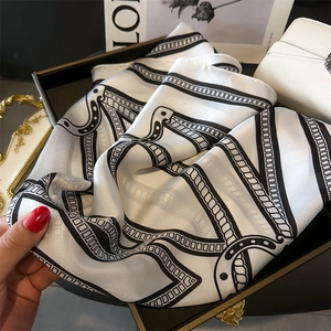 Elegant French chain print silk scarf in white and black with geometric pattern