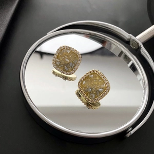 Square geometric stud earrings with yellow gradient crystal and sparkling white diamonds