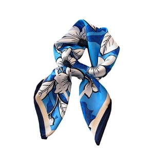 Royal blue floral silk square scarf with white flower patterns and elegant satin finish