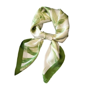 Green and white floral silk scarf with elegant leaf print and smooth satin texture