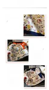 Detail showing digital floral print on faux silk scarf with high-quality rolled edges