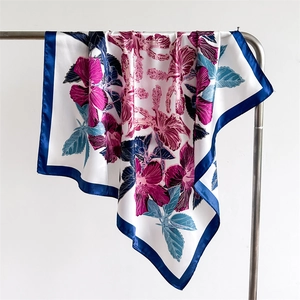 Elegant white satin floral silk scarf with pink hibiscus prints and navy blue border