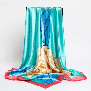 Elegant satin floral square scarf in turquoise with blue feathers and red borders