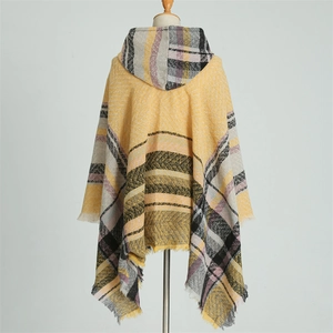 Detailed back view of a hooded plaid poncho wrap with yellow check pattern and fringes