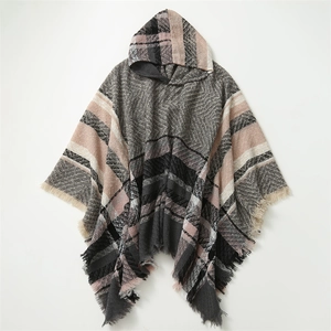 Detail view of hooded plaid shawl with grey and pink patterns and tassel fringe trim